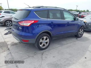 2013 Ford Escape SE with VIN 1FMCU0GXXDUB85818, listed as a IAAI auction lot 41848033 with 128,638 mi miles and . Bid and sale history available at DreamBid. Image 4.