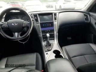 2014 Infiniti Q50 Premium с VIN JN1BV7ARXEM697759, выставлен на аукционе Copart как лот 55996815 с пробегом 129 642 миль миль и Списание • Salvage title. История ставок и продаж доступна на DreamBid. Изображение 8.