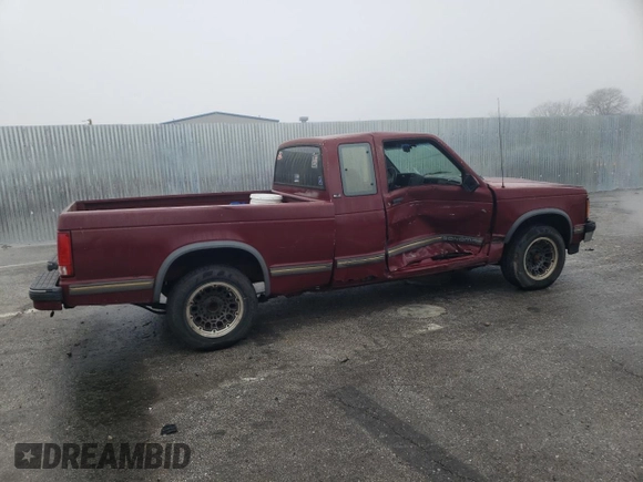 1993 GMC Sonoma z VIN 1GTCS19ZXP8503223, wystawiony jako Copart lot #86344214 z przebiegiem 175 849 mil mil oraz Szkody całkowita. Historia ofert i sprzedaży dostępna na DreamBid. Obrazek 3.