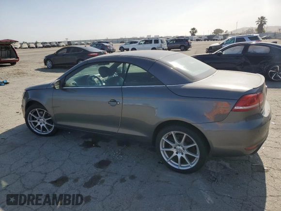 2012 Volkswagen Eos Executive with VIN WVWFW7AH4CV006428, listed as a Copart auction lot 61144685 with 101,514 mi miles and Salvage title. Bid and sale history available at DreamBid. Image 2.