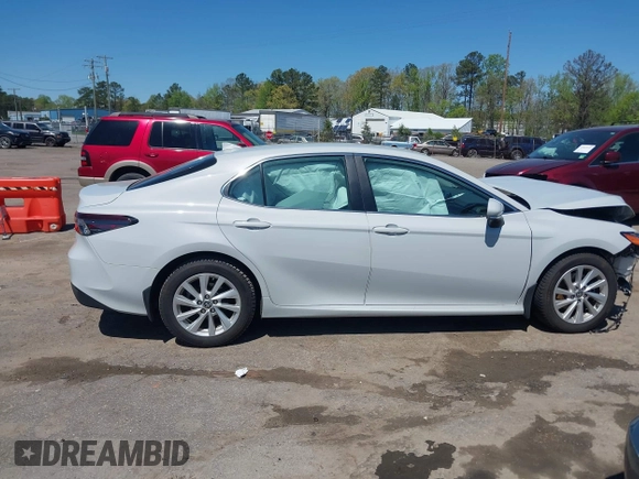 2023 Toyota Camry LE z VIN 4T1C11AK9PU142300, wystawiony jako IAAI lot #42063540 z przebiegiem 34 048 mil mil oraz . Historia ofert i sprzedaży dostępna na DreamBid. Obrazek 13.