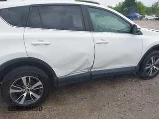 2018 Toyota RAV4 XLE with VIN 2T3WFREV4JW469929, listed as a IAAI auction lot 42536958 with 82,443 mi miles and . Bid and sale history available at DreamBid. Image 6.