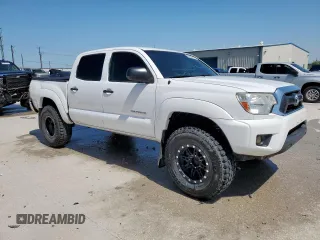 2014 Toyota Tacoma with VIN 5TFLU4EN6EX109655, listed as a Copart auction lot 51153615 with 201,394 mi miles and Salvage Title. Bid and sale history available at carsss.com. Image 4.