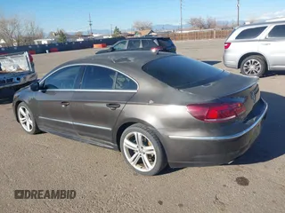 2014 Volkswagen CC Sport with VIN WVWBP7AN7EE514221, listed as a IAAI auction lot 41528930 with 140,227 mi miles and . Bid and sale history available at DreamBid. Image 3.