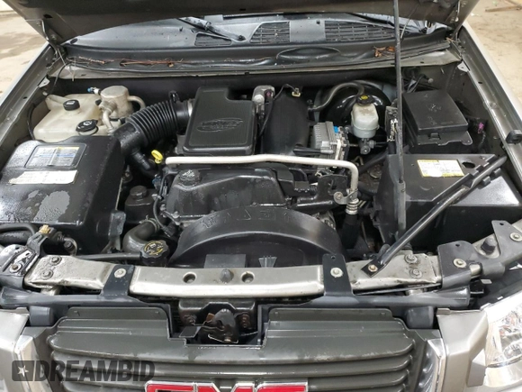 2005 GMC Envoy SLE with VIN 1GKDS13S952383743, listed as a Copart auction lot 43797315 with 185,833 mi miles and Salvage title. Bid and sale history available at DreamBid. Image 12.