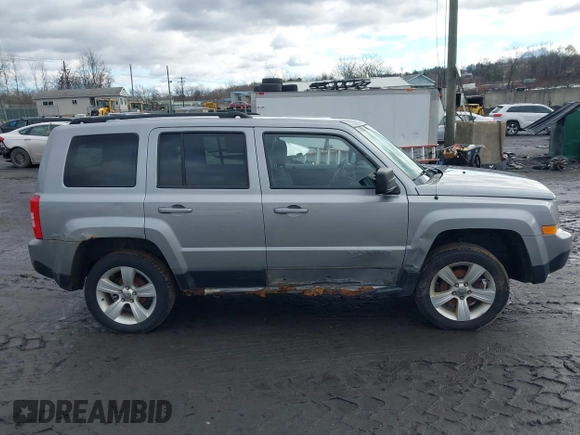 2014 Jeep Patriot Latitude with VIN 1C4NJRFB6ED778433, listed as a IAAI auction lot 41211522 with 127,506 mi miles. Bid and sale history available at carsss.com. Image 13.