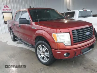 2014 Ford F-150 XL with VIN 1FTFW1CF1EKD58198, listed as a IAAI auction lot 42086106 with 401,943 mi miles. Bid and sale history available at carsss.com. Image 1.