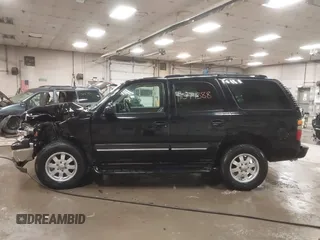 2004 Chevrolet Tahoe Z71 with VIN 1GNEK13T64R100267, listed as a IAAI auction lot 41544388 with 212,525 mi miles and . Bid and sale history available at DreamBid. Image 14.