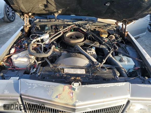1990 Cadillac Brougham z VIN 1G6DW5472LR711206, wystawiony jako Copart lot #75627814 z przebiegiem Nie podano mil oraz Nie do naprawy. Historia ofert i sprzedaży dostępna na DreamBid. Obrazek 11.
