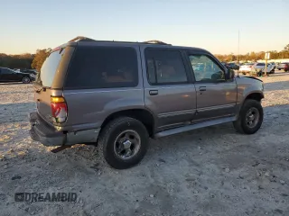 1997 Ford Explorer XL with VIN 1FMDU34XXVUC61582, listed as a Copart auction lot 81957344 with 153,852 mi miles and Salvage title. Bid and sale history available at DreamBid. Image 3.