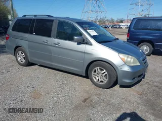 2007 Honda Odyssey EX-L with VIN 5FNRL38787B019019, listed as a IAAI auction lot 41974224 with 170,706 mi miles. Bid and sale history available at carsss.com. Image 1.