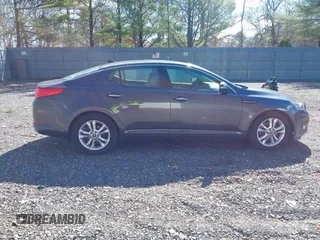 2011 Kia Optima EX with VIN KNAGN4A61B5131919, listed as a IAAI auction lot 41740091 with 102,065 mi miles and . Bid and sale history available at carsss.com. Image 13.