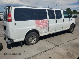 2015 Chevrolet Express Passenger LT with VIN 1GAZG1FG6F1217514, listed as a Copart auction lot 64759505 with 270,681 mi miles and Clean title. Bid and sale history available at DreamBid. Image 3.