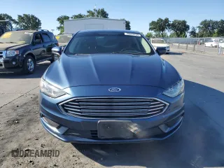 2018 Ford Fusion SE z VIN 3FA6P0H7XJR110391, wystawiony jako Copart lot #58069735 z przebiegiem 168 222 mil mil oraz Szkoda całkowita • Salvage title. Historia ofert i sprzedaży dostępna na DreamBid. Obrazek 5.