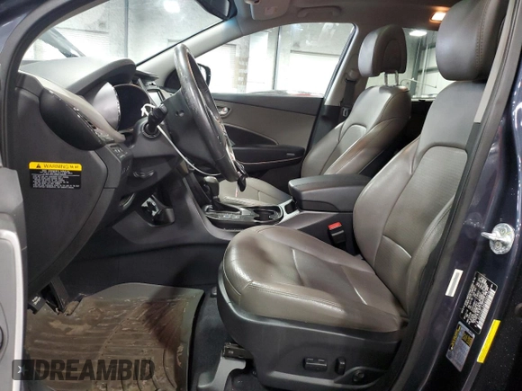 2014 Hyundai Santa Fe z VIN 5XYZUDLB0EG200376, wystawiony jako Copart lot #53634165 z przebiegiem 64 561 mil mil oraz Szkoda całkowita • Salvage title. Historia ofert i sprzedaży dostępna na DreamBid. Obrazek 7.