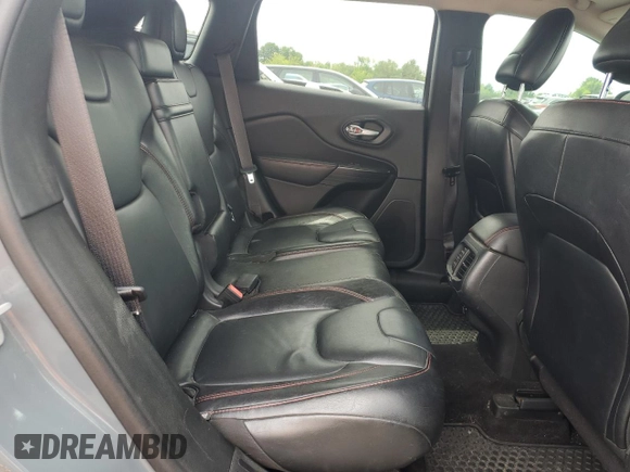 2014 Jeep Cherokee Trailhawk with VIN 1C4PJMBS3EW308706, listed as a Copart auction lot 58307975 with 90,530 mi miles and Salvage title. Bid and sale history available at DreamBid. Image 11.