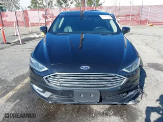 2017 Ford Fusion Energi Titanium with VIN 3FA6P0SU1HR116976, listed as a IAAI auction lot 39028290 with 86,678 mi miles. Bid and sale history available at carsss.com. Image 12.