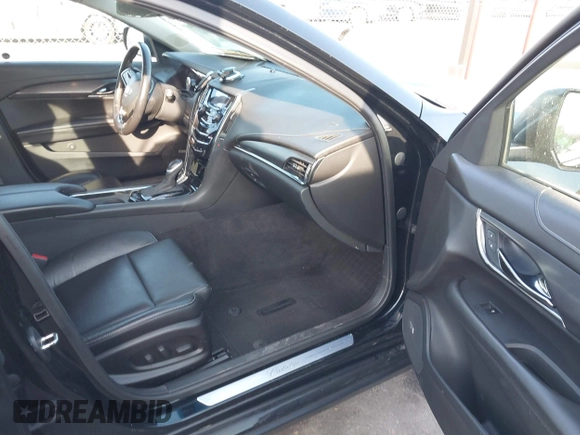 2014 Cadillac ATS Standard RWD with VIN 1G6AA5RA7E0100973, listed as a IAAI auction lot 41795657 with 93,807 mi miles and . Bid and sale history available at DreamBid. Image 5.