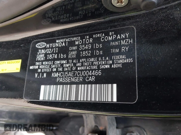 2012 Hyundai Accent SE with VIN KMHCU5AE7CU004466, listed as a IAAI auction lot 41602472 with 144,843 mi miles. Bid and sale history available at carsss.com. Image 9.