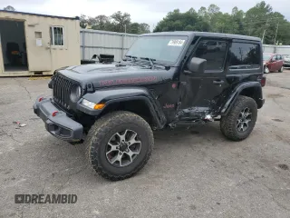 2020 Jeep Wrangler Rubicon with VIN 1C4HJXCG4LW175807, listed as a Copart auction lot 79909184 with 56,935 mi miles and Salvage title. Bid and sale history available at DreamBid. Image 1.