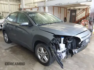 2021 Hyundai Kona SE z VIN KM8K1CAA4MU645470, wystawiony jako IAAI lot #41727340 z przebiegiem 71 932 mil mil oraz . Historia ofert i sprzedaży dostępna na DreamBid. Obrazek 1.