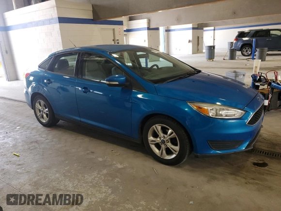 2015 Ford Focus SE with VIN 1FADP3F27FL329928, listed as a Copart auction lot 60795595 with 120,277 mi miles and Clean title. Bid and sale history available at DreamBid. Image 4.