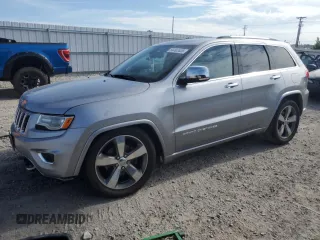 2015 Jeep Grand Cherokee Overland with VIN 1C4RJFCG2FC225186, listed as a Copart auction lot 64493405 with 92,704 mi miles and Clean title. Bid and sale history available at DreamBid. Image 1.