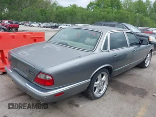 2002 Jaguar XJ with VIN SAJDA12CX2LF49531, listed as a IAAI auction lot 42124743 with 120,486 mi miles. Bid and sale history available at carsss.com. Image 4.