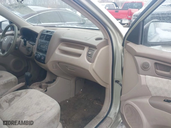 2007 Kia Sportage LX with VIN KNDJF724077301574, listed as a IAAI auction lot 41324962 with 229,597 mi miles. Bid and sale history available at carsss.com. Image 5.