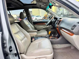 2003 Lexus GX 470 z VIN JTJBT20X130004567, wystawiony jako Copart lot #57682615 z przebiegiem 237 809 mil mil oraz Szkoda całkowita • Salvage title. Historia ofert i sprzedaży dostępna na DreamBid. Obrazek 5.