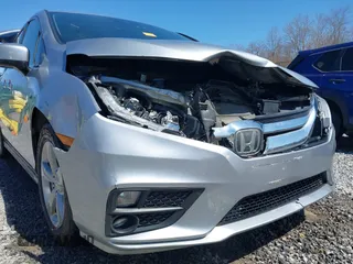 2018 Honda Odyssey EX-L with VIN 5FNRL6H75JB092633, listed as a IAAI auction lot 41971589 with 103,099 mi miles and . Bid and sale history available at DreamBid. Image 6.