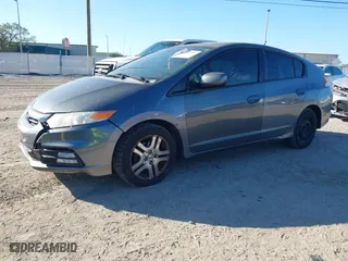 2012 Honda Insight LX with VIN JHMZE2H51CS003694, listed as a IAAI auction lot 41781384 with 154,685 mi miles. Bid and sale history available at carsss.com. Image 18.