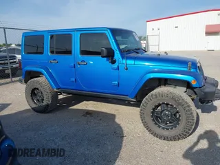 2016 Jeep Wrangler Unlimited 75th Anniversary with VIN 1C4BJWEG7GL179001, listed as a IAAI auction lot 42030735 with 123,681 mi miles. Bid and sale history available at carsss.com. Image 13.