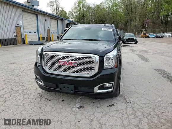 2015 GMC Yukon SLE with VIN 1GKS2AKC3FR664740, listed as a Copart auction lot 53824145 with 194,655 mi miles and Salvage Title. Bid and sale history available at carsss.com. Image 14.