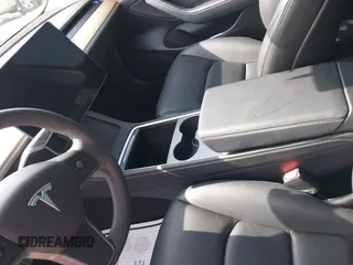 2023 Tesla Model 3 с VIN 5YJ3E1EA0PF589066, выставлен на аукционе IAAI как лот 42508495 с пробегом Не указан миль и . История ставок и продаж доступна на DreamBid. Изображение 19.
