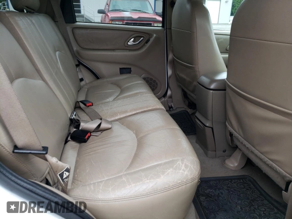 2001 Mazda Tribute LX with VIN 4F2CU08101KM11452, listed as a Copart auction lot 76796064 with 175,584 mi miles and Salvage Title. Bid and sale history available at DreamBid. Image 11.