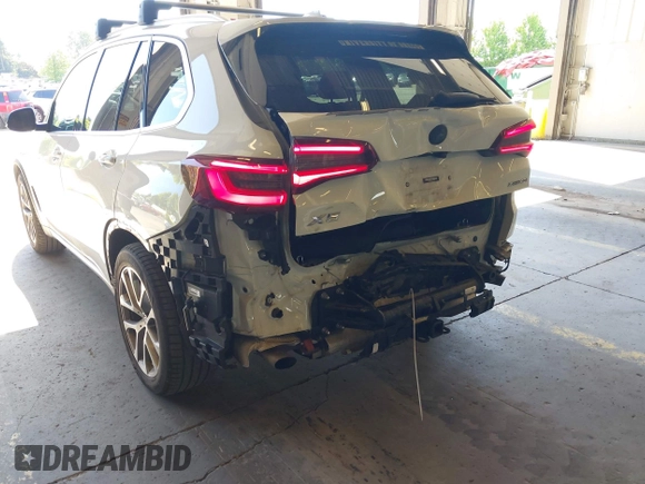 2022 BMW X5 xDrive40i with VIN 5UXCR6C09N9M21945, listed as a IAAI auction lot 42170363 with 23,537 mi miles and . Bid and sale history available at DreamBid. Image 18.
