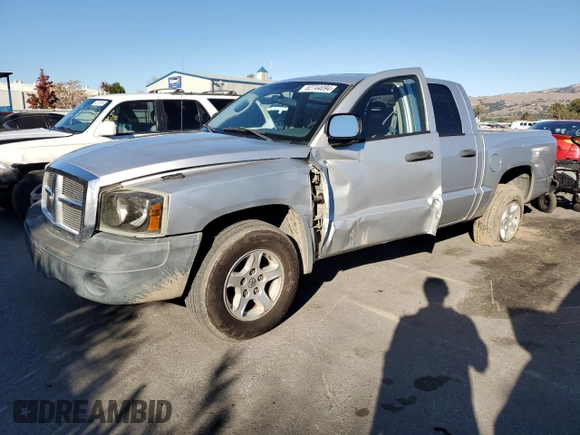 2007 Dodge Dakota SLT with VIN 1D7HE48K47S103248, listed as a Copart auction lot 82744094 with 126,126 mi miles and Salvage Title. Bid and sale history available at DreamBid. Image 1.