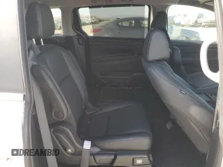 2024 Honda Odyssey EX-L z VIN 5FNRL6H65RB047405, wystawiony jako Copart lot #57880245 z przebiegiem Nie podano mil oraz Czysty tytuł • Clean title. Historia ofert i sprzedaży dostępna na DreamBid. Obrazek 11.