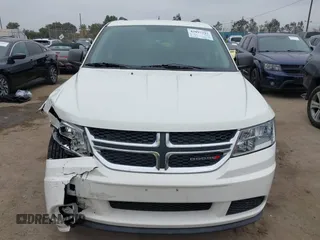 2014 Dodge Journey American Value with VIN 3C4PDCAB8ET141803, listed as a IAAI auction lot 42097292 with 76,339 mi miles and . Bid and sale history available at DreamBid. Image 12.
