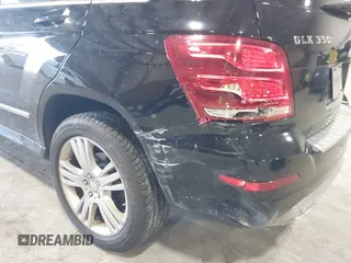2015 Mercedes-Benz GLK with VIN WDCGG8JB0FG364079, listed as a IAAI auction lot 42096003 with 113,571 mi miles. Bid and sale history available at carsss.com. Image 19.