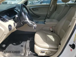 2014 Ford Taurus SEL with VIN 1FAHP2E82EG139480, listed as a Copart auction lot 52765215 with 114,600 mi miles and Salvage Title. Bid and sale history available at carsss.com. Image 7.