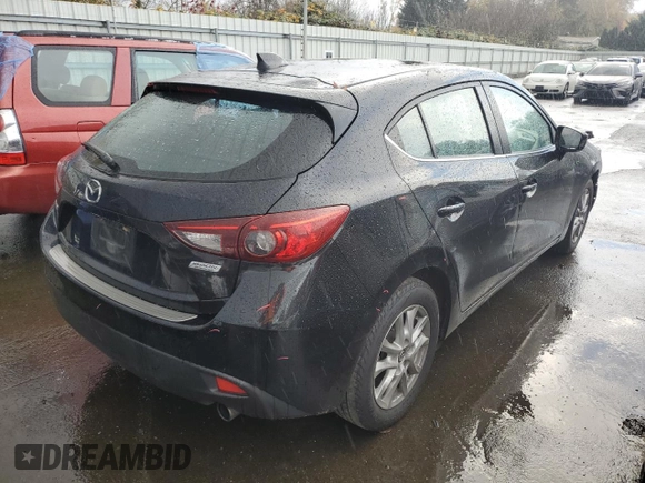 2014 Mazda 3 i Grand Touring with VIN JM1BM1M72E1102296, listed as a Copart auction lot 79222024 with 144,122 mi miles and Salvage Title. Bid and sale history available at DreamBid. Image 3.