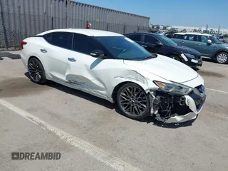 2016 Nissan Maxima SV z VIN 1N4AA6AP6GC903638, wystawiony jako IAAI lot #42180421 z przebiegiem 124 586 mil mil oraz . Historia ofert i sprzedaży dostępna na DreamBid. Obrazek 1.