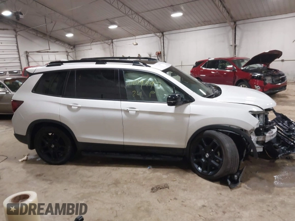 2024 Honda Passport Black Edition with VIN 5FNYF8H86RB001825, listed as a IAAI auction lot 41019497 with 15,884 mi miles and . Bid and sale history available at DreamBid. Image 13.