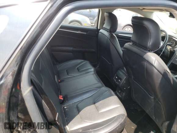 2017 Ford Fusion Titanium с VIN 3FA6P0K93HR170257, выставлен на аукционе Copart как лот 50977791 с пробегом 96 692 миль миль и Списание • Salvage title. История ставок и продаж доступна на DreamBid. Изображение 6.