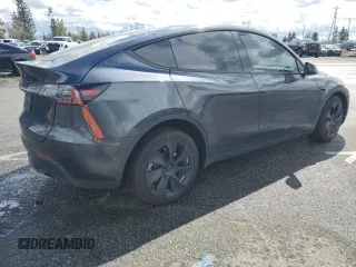 2024 Tesla Model Y z VIN 7SAYGDED1RF089192, wystawiony jako Copart lot #48752085 z przebiegiem 7 643 mil mil oraz Szkoda całkowita • Salvage title. Historia ofert i sprzedaży dostępna na DreamBid. Obrazek 3.