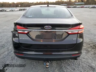 2018 Ford Fusion SE z VIN 3FA6P0H72JR132966, wystawiony jako Copart lot #76664004 z przebiegiem 145 653 mil mil oraz Szkoda całkowita • Salvage title. Historia ofert i sprzedaży dostępna na DreamBid. Obrazek 6.