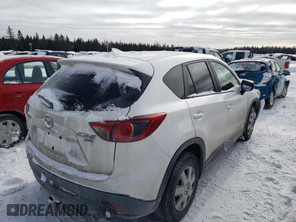 2016 Mazda CX-5 Touring z VIN JM3KE4CY1G0703496, wystawiony jako Copart lot #43806525 z przebiegiem Nie podano mil oraz Szkoda całkowita • Salvage title. Historia ofert i sprzedaży dostępna na DreamBid. Obrazek 3.