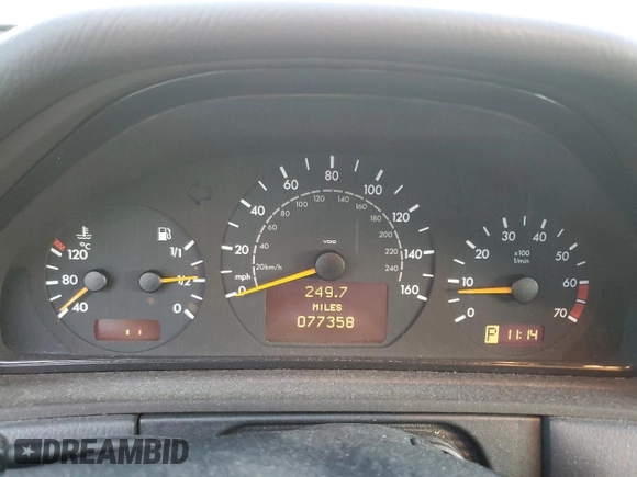 2002 Mercedes-Benz E-Class with VIN WDBJF82J32X066803, listed as a Copart auction lot 85474614 with 77,358 mi miles and Salvage Title. Bid and sale history available at carsss.com. Image 9.